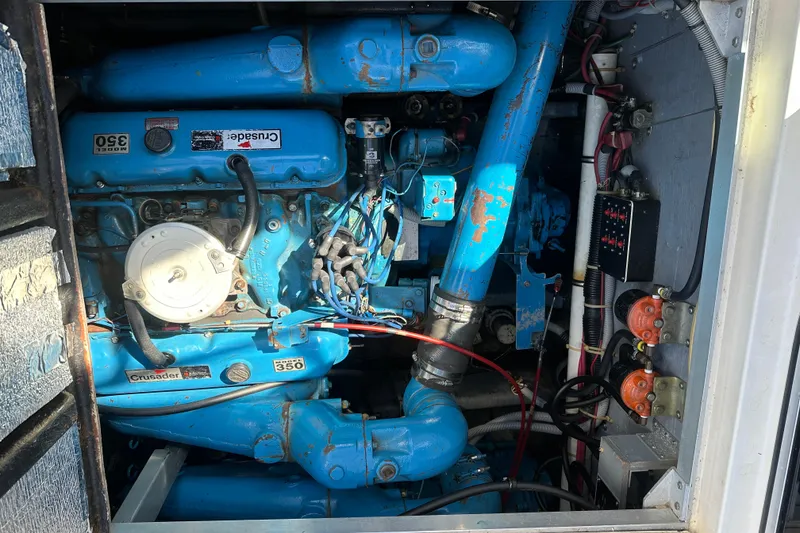 Slide: The Image of Engine compartment of a 1987 Sea Ray 340 Sundancer with Crusader 350 engine. - 44