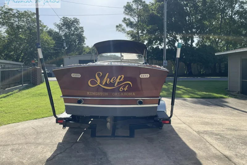 Slide: The Image of Vintage 1964 Shepherd 22 boat on trailer, labeled "Shep 64 Kingston Oklahoma." - 1