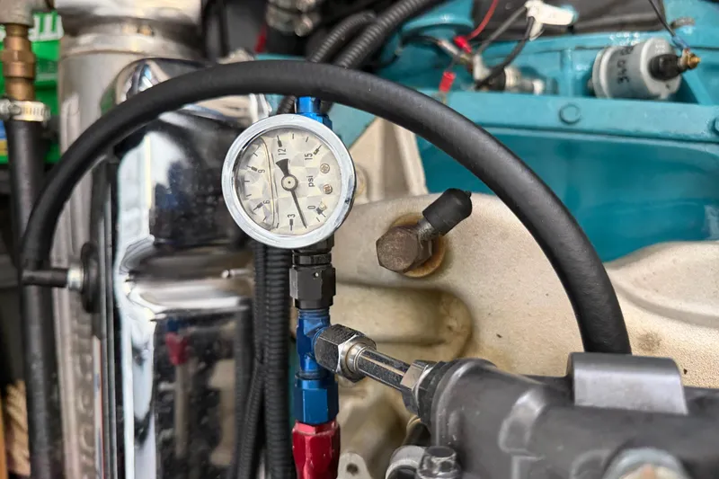 Slide: The Image of Close-up of a pressure gauge in a 1964 Shepherd 22 engine compartment. - 17