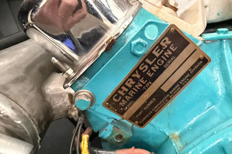 Slide: The Image of Chrysler marine engine label on a vintage 1964 Shepherd 22 boat. - 18