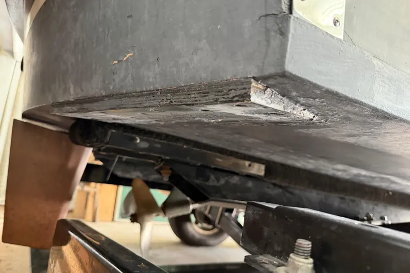 Slide: The Image of Close-up of a 1964 Shepherd 22 boat's underside, showing wear and structural details. - 22