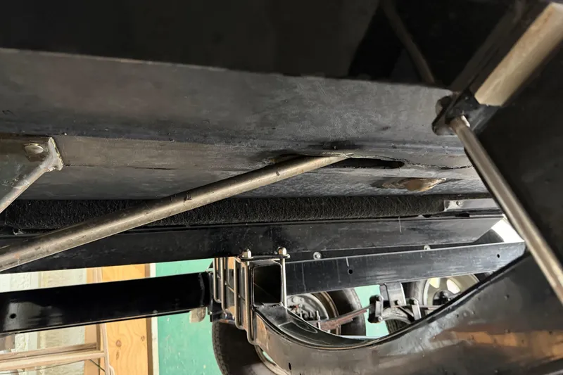 Slide: The Image of Underside view of a 1964 Shepherd 22 vehicle, showcasing suspension and structural components. - 25