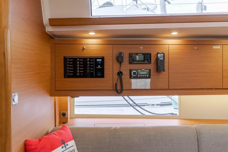 Slide: The Image of Interior of 2024 Dufour 470 yacht with control panel and communication devices. - 34