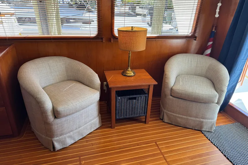 Slide: The Image of Interior of 2006 DeFever 52 Euro yacht with two armchairs and a lamp. - 18