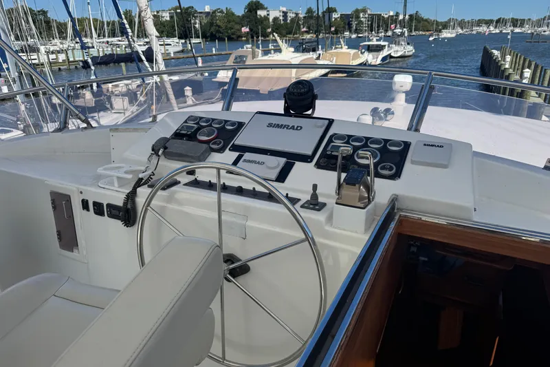 Slide: The Image of Helm of 2006 DeFever 52 Euro yacht with navigation equipment and steering wheel. - 2