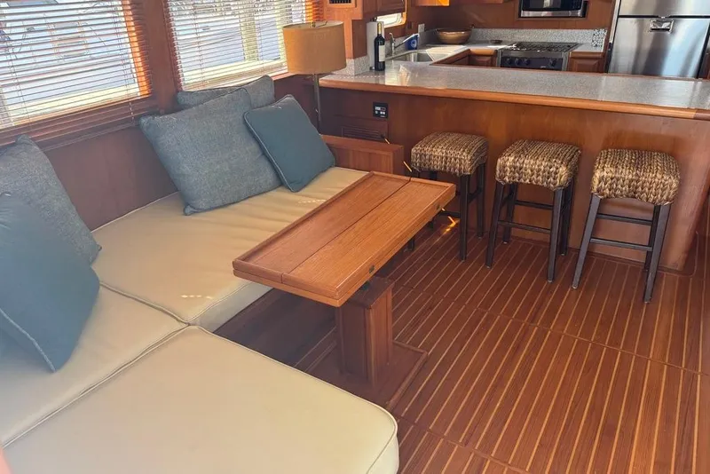 Slide: The Image of Luxurious interior of 2006 DeFever 52 Euro yacht with cozy seating and modern kitchen. - 21