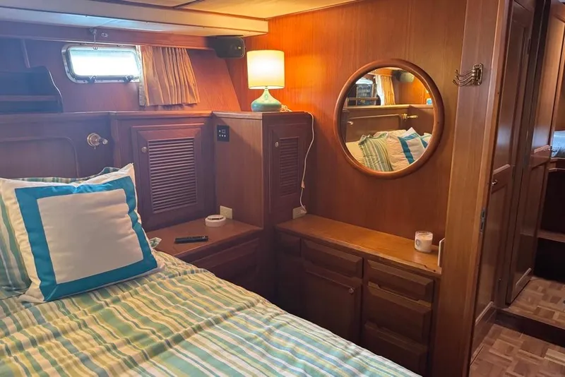 Slide: The Image of Cozy cabin interior of 2006 DeFever 52 Euro yacht with bed, mirror, and lamp. - 43