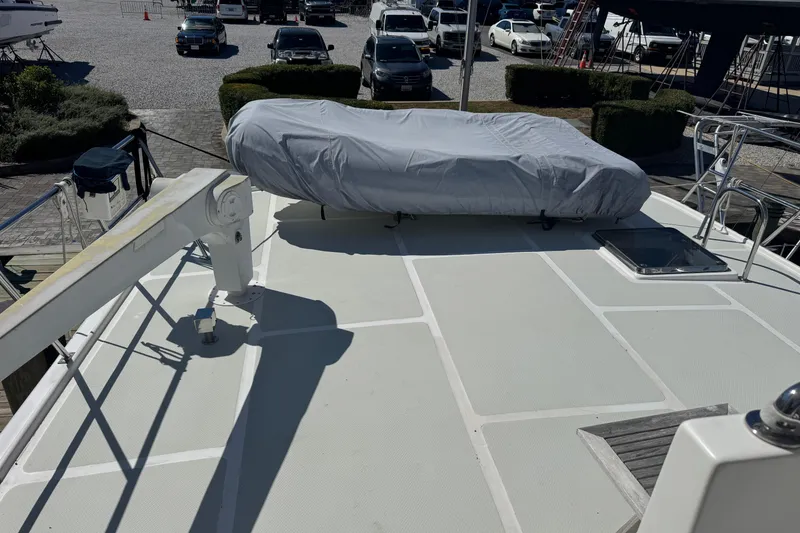 Slide: The Image of Rooftop view of 2006 DeFever 52 Euro yacht with covered equipment. - 49
