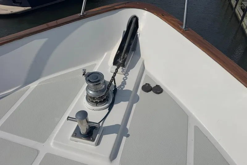 Slide: The Image of Bow of 2006 DeFever 52 Euro yacht with anchor windlass and chain. - 5