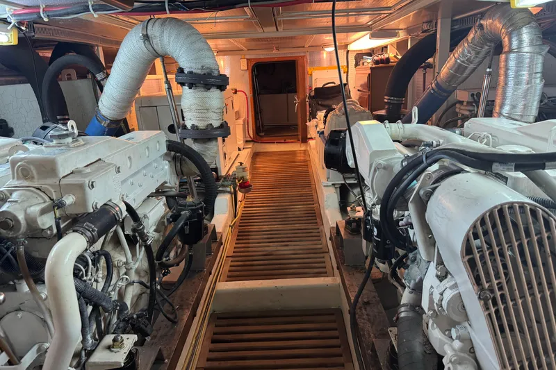 Slide: The Image of Engine room of 2006 DeFever 52 Euro yacht with visible machinery and equipment. - 51