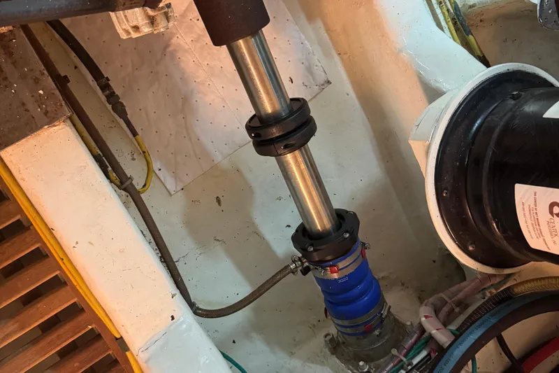 Slide: The Image of Engine room of 2006 DeFever 52 Euro yacht showing mechanical components and piping. - 55