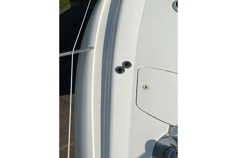 Slide: The Image of Close-up of 1998 Sunseeker Predator 58 yacht deck, showcasing sleek design and fittings. - 21