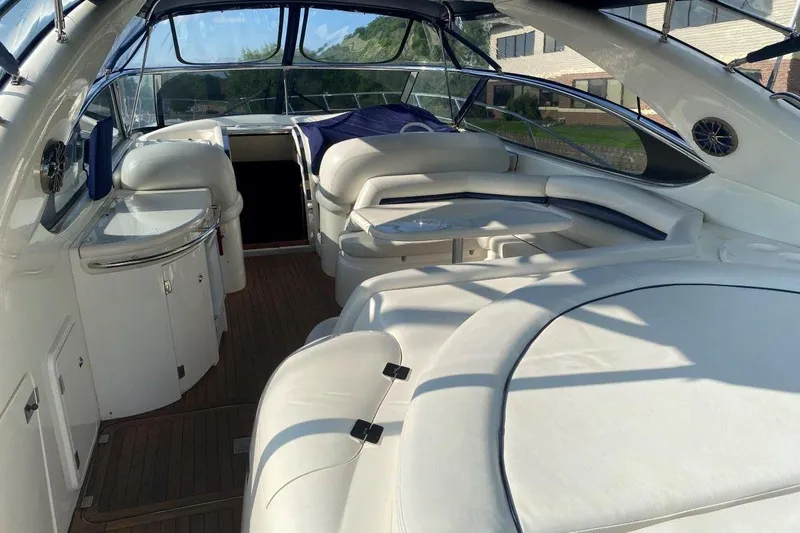 Slide: The Image of Luxurious interior of 1998 Sunseeker Predator 58 yacht with white leather seating. - 24