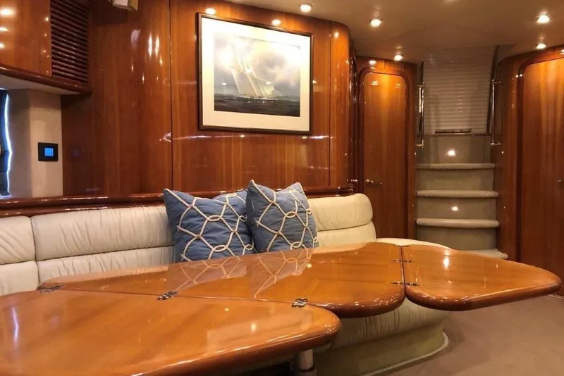 Slide: The Image of Luxurious interior of 1998 Sunseeker Predator 58 yacht with elegant wood finish and plush seating. - 35
