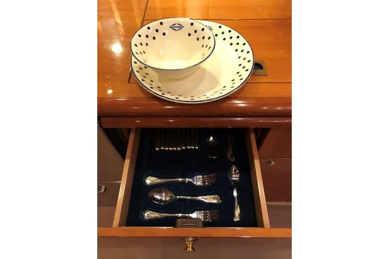 Slide: The Image of Polka dot bowls and cutlery drawer on 1998 Sunseeker Predator 58 yacht. - 48