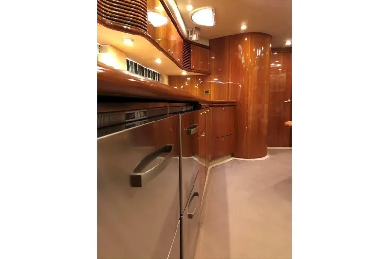 Slide: The Image of Luxurious interior of 1998 Sunseeker Predator 58 yacht with polished wood finishes. - 56