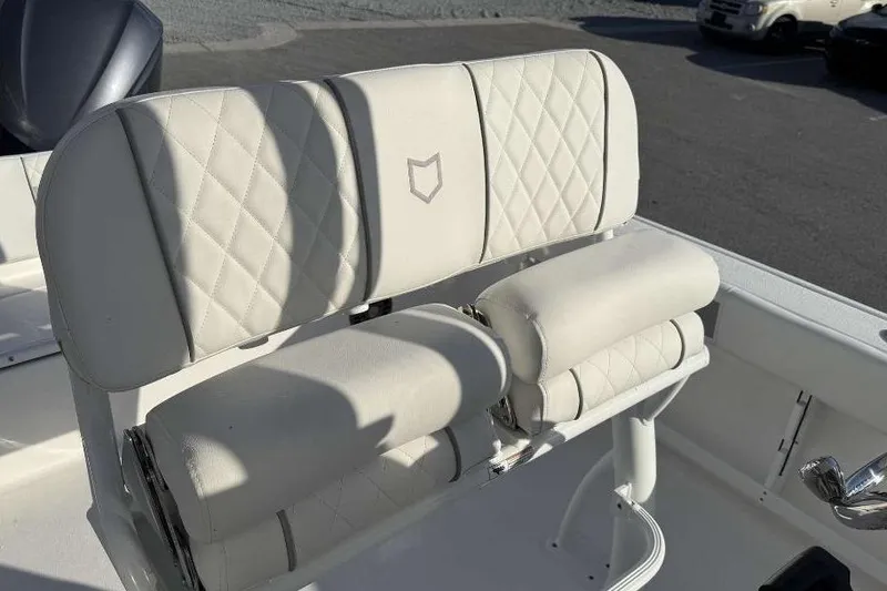 Slide: The Image of 2026 Sea Fox 248 Commander boat seat with diamond-stitched upholstery in a marine setting. - 19