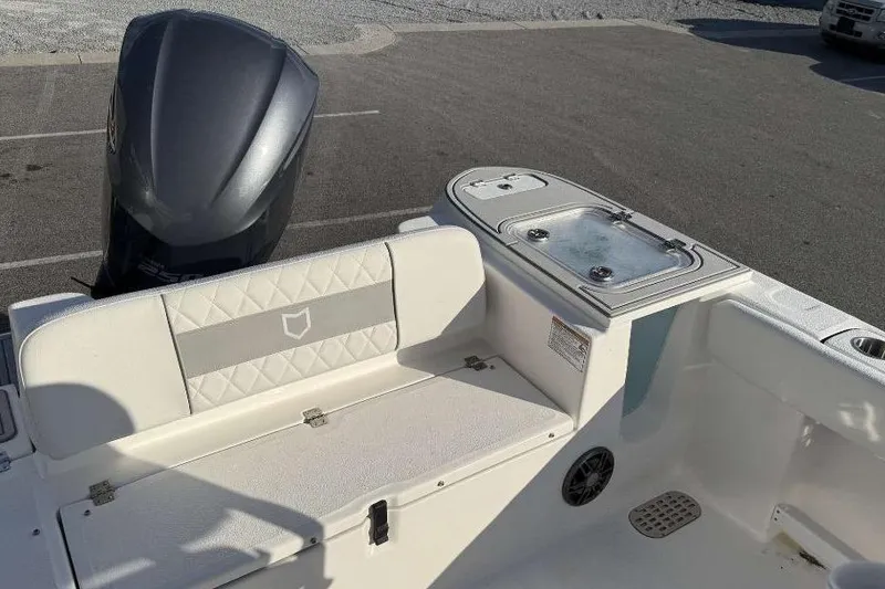 Slide: The Image of 2026 Sea Fox 248 Commander boat interior with seating and engine view. - 21