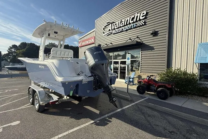 Slide: The Image of 2026 Sea Fox 248 Commander boat on trailer outside Avalanche Motorsports. - 7