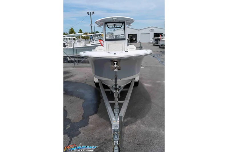Slide: The Image of 2026 Sea Hunt Gamefish 25 boat on trailer at dealership. - 10