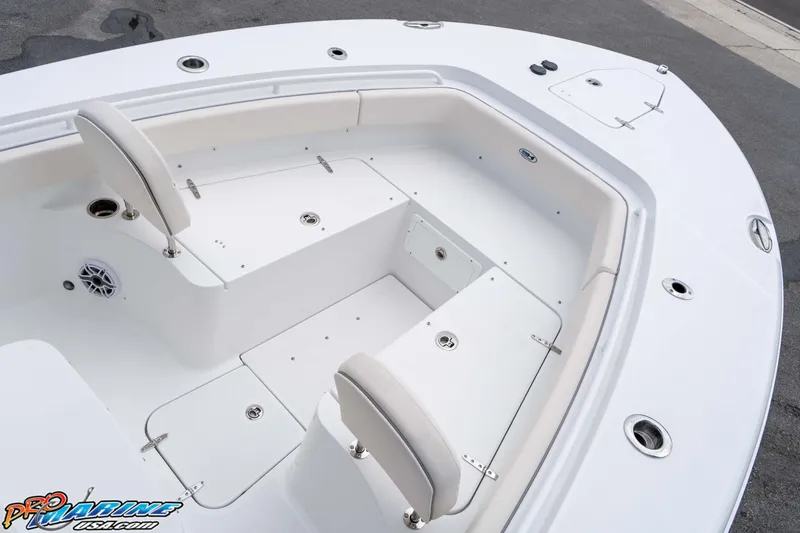 Slide: The Image of 2026 Sea Hunt Gamefish 25 boat interior with seating and storage compartments. - 21