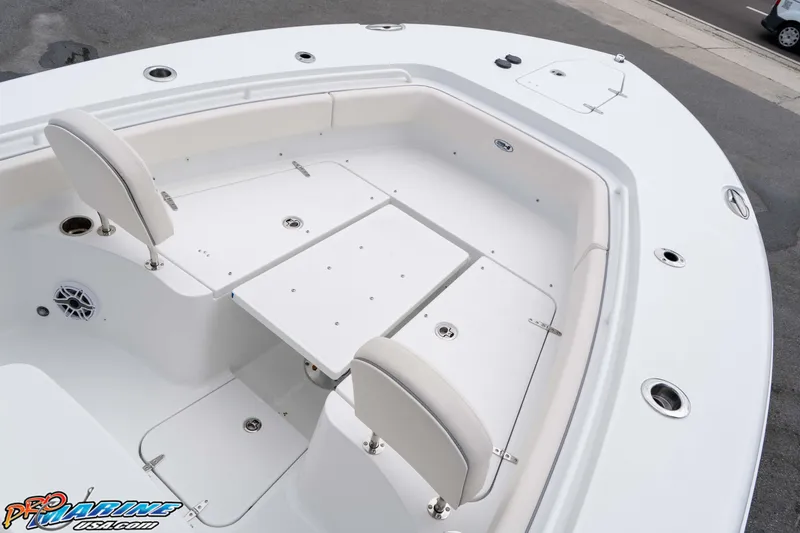 Slide: The Image of 2026 Sea Hunt Gamefish 25 boat interior with seating and storage compartments. - 22