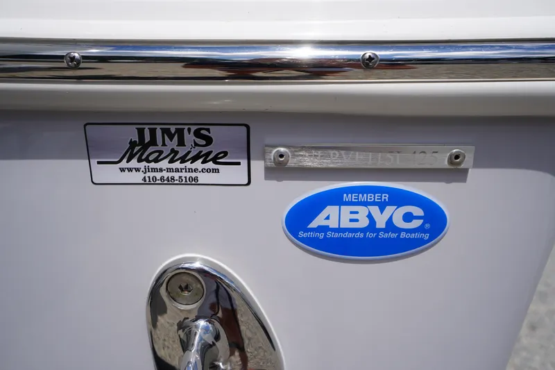 Slide: The Image of 2025 Tidewater 272 LXF boat with Jim's Marine and ABYC member stickers. - 17