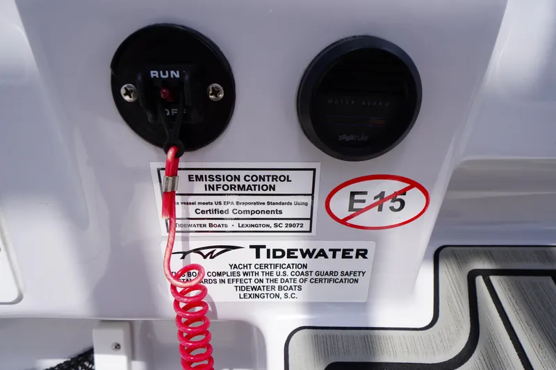 Slide: The Image of 2025 Tidewater 272 LXF boat emission control panel with E15 fuel warning. - 41