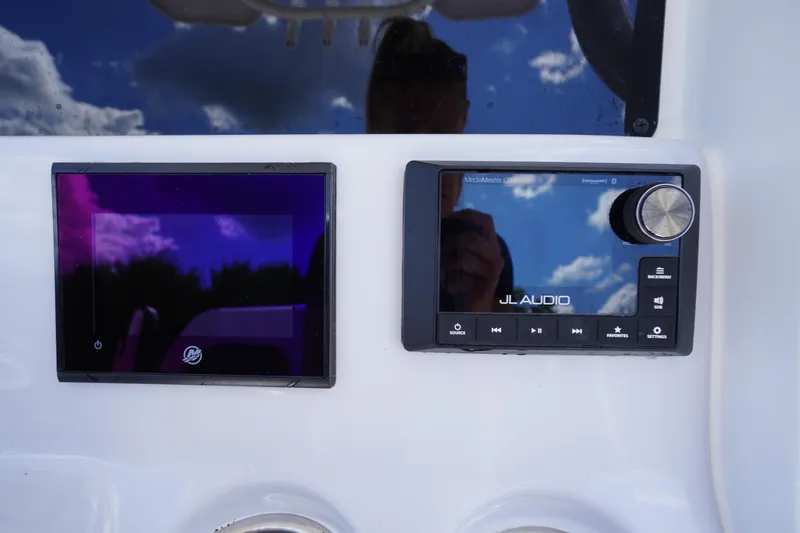 Slide: The Image of Control panel of 2025 Tidewater 272 LXF boat with JL Audio system. - 51