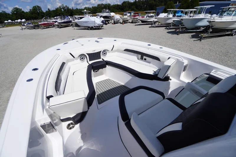 Slide: The Image of 2025 Tidewater 272 LXF boat interior with sleek seating and modern design. - 63