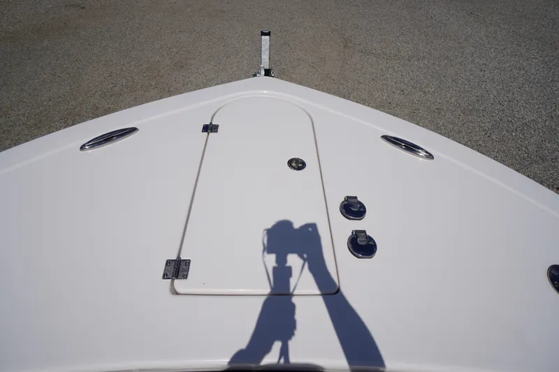 Slide: The Image of Bow of 2025 Tidewater 272 LXF boat with hatch and cleats. - 75
