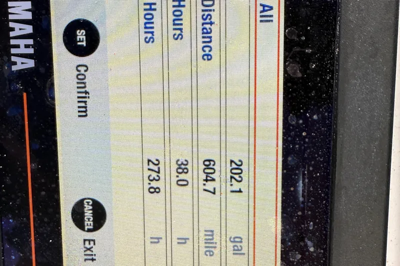 Slide: The Image of Display screen showing fuel usage and distance for 2016 Sea Hunt Ultra 235 SE boat. - 18