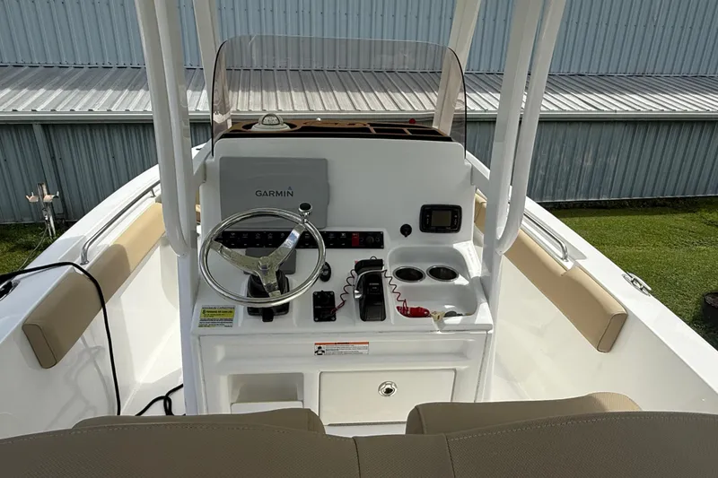 Slide: The Image of 2016 Sea Hunt Ultra 235 SE boat console with Garmin navigation system. - 7