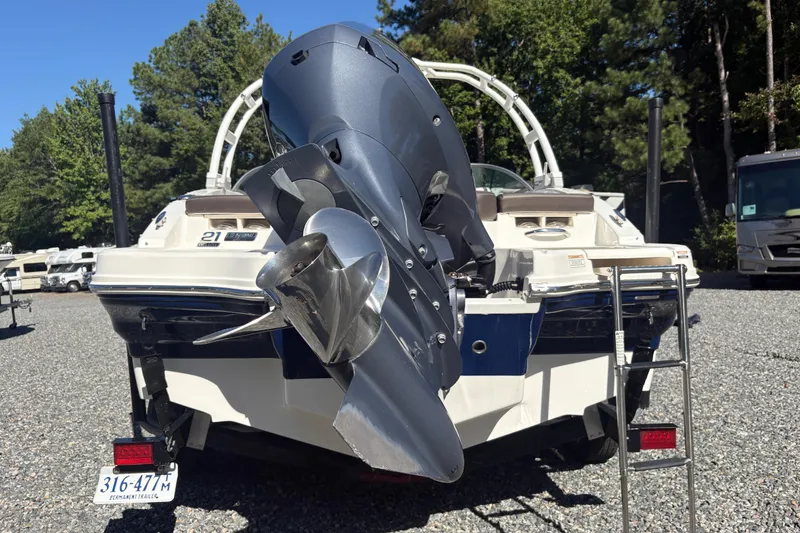 Slide: The Image of Rear view of 2019 Chaparral 18 H2O Sport boat with outboard motor. - 3