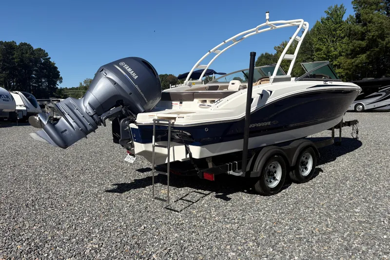 Slide: The Image of 2019 Chaparral 18 H2O Sport boat with Yamaha outboard motor on trailer. - 4