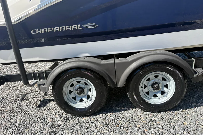 Slide: The Image of 2019 Chaparral 18 H2O Sport boat on trailer with dual wheels. - 5