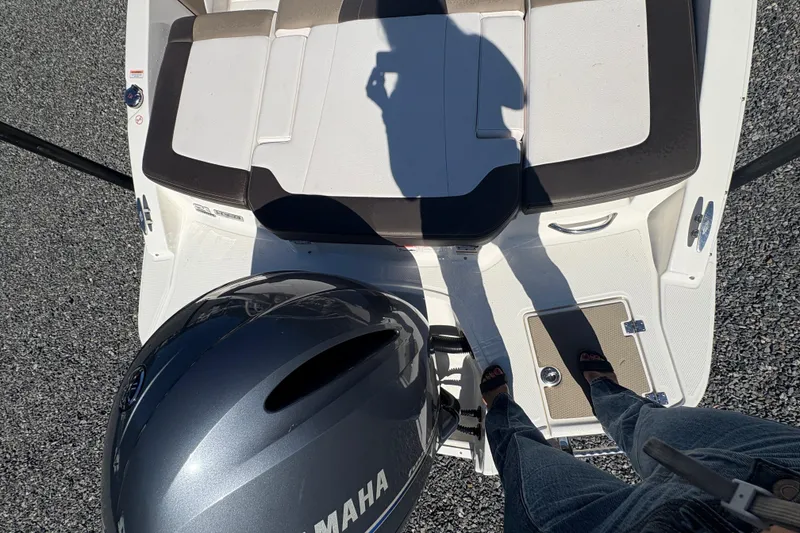 Slide: The Image of 2019 Chaparral 18 H2O Sport boat with Yamaha engine, viewed from above. - 8