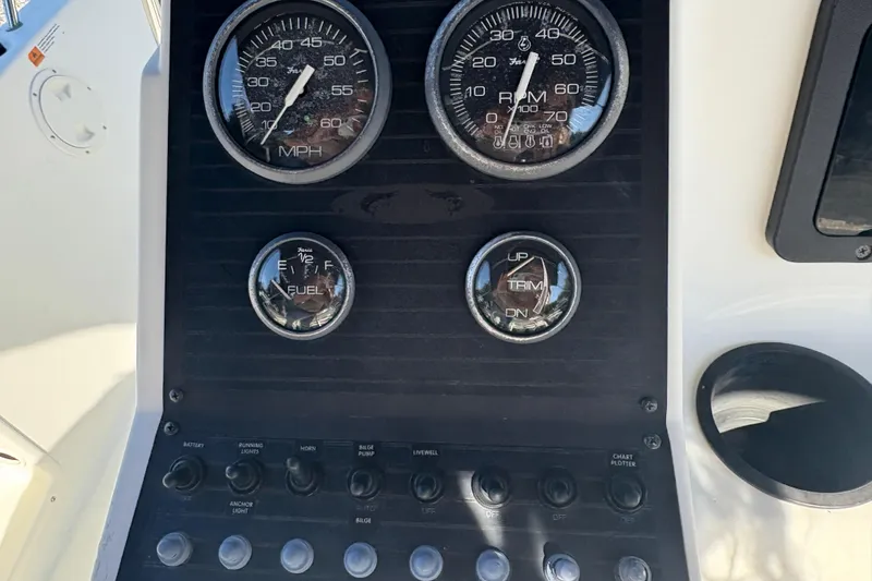 Slide: The Image of Dashboard of 2000 Hydra-Sports 180 Seahorse CC with gauges and controls. - 12