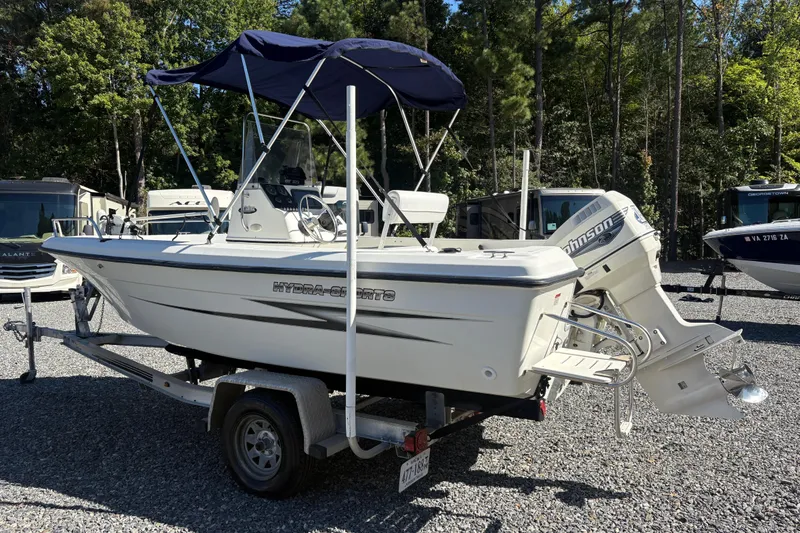 Slide: The Image of 2000 Hydra-Sports 180 Seahorse CC boat on trailer, parked outdoors. - 3
