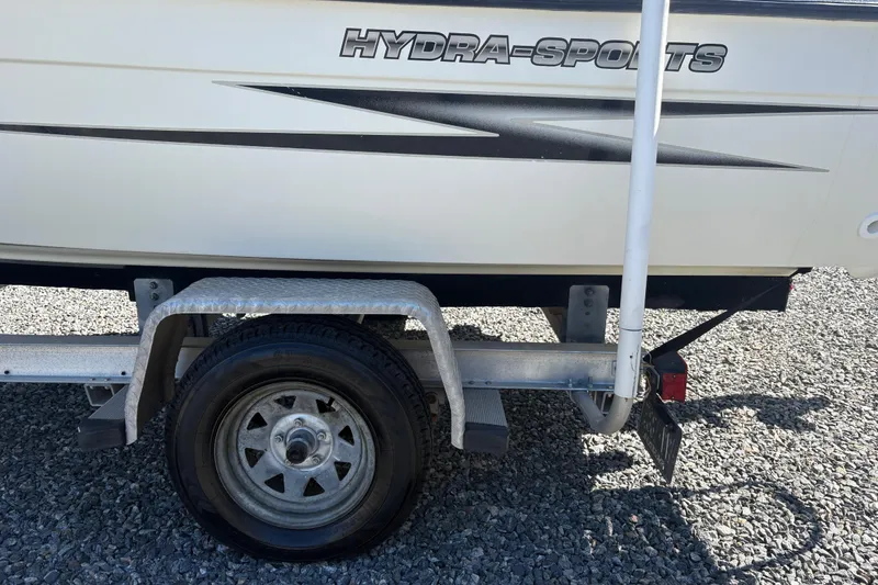Slide: The Image of 2000 Hydra-Sports 180 Seahorse CC boat on trailer, side view with logo. - 7
