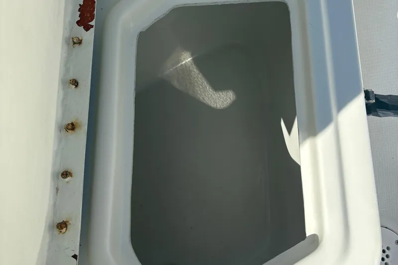 Slide: The Image of Open storage compartment on 2000 Hydra-Sports 180 Seahorse CC boat. - 9