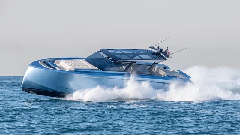 The Image of 2024 Vanquish Yachts VQ58 cruising on open water, showcasing sleek design and performance. - 0