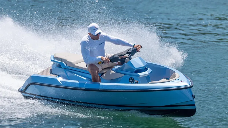 Slide: The Image of 2024 Vanquish Yachts VQ58 in action on the water, sleek design, vibrant blue color. - 9