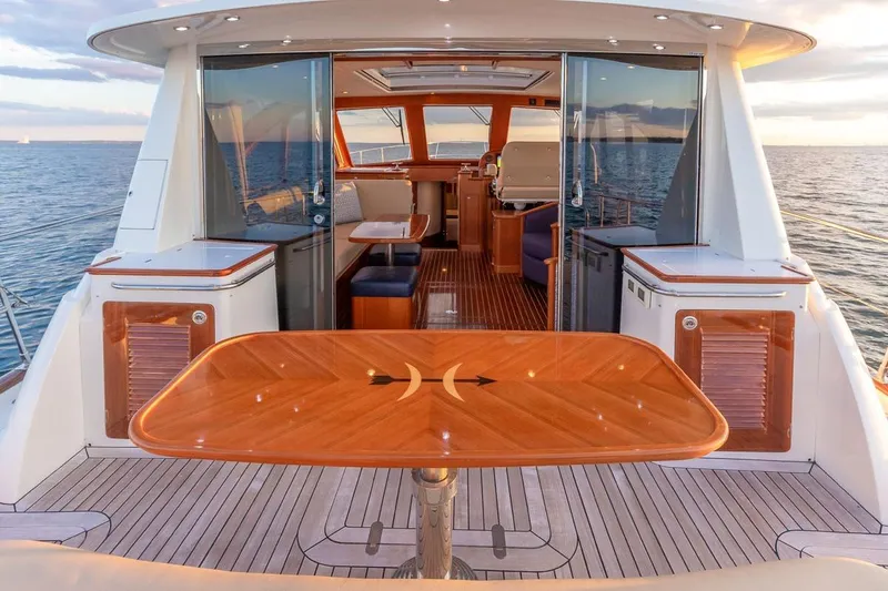 Slide: The Image of Luxurious 2014 Hunt Yachts 44 interior with elegant wood finishes and ocean view. - 12
