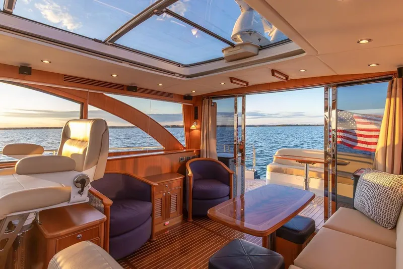 Slide: The Image of Luxurious interior of 2014 Hunt Yachts 44 with ocean view and American flag. - 13