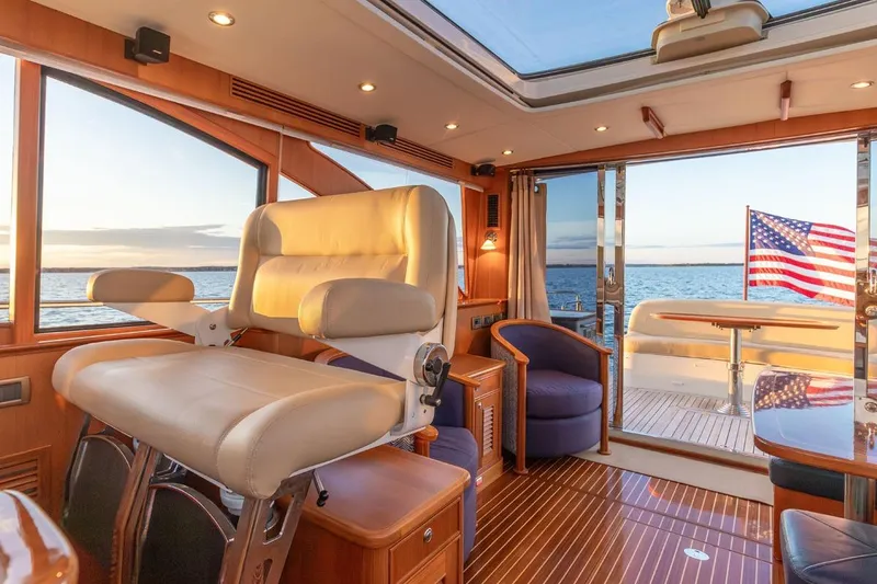 Slide: The Image of Luxurious interior of 2014 Hunt Yachts 44 with ocean view and American flag. - 15