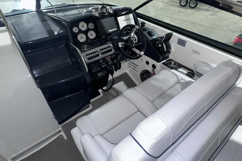 Slide: The Image of Interior of 2022 Formula 350 Sun Sport boat with modern dashboard and seating. - 20