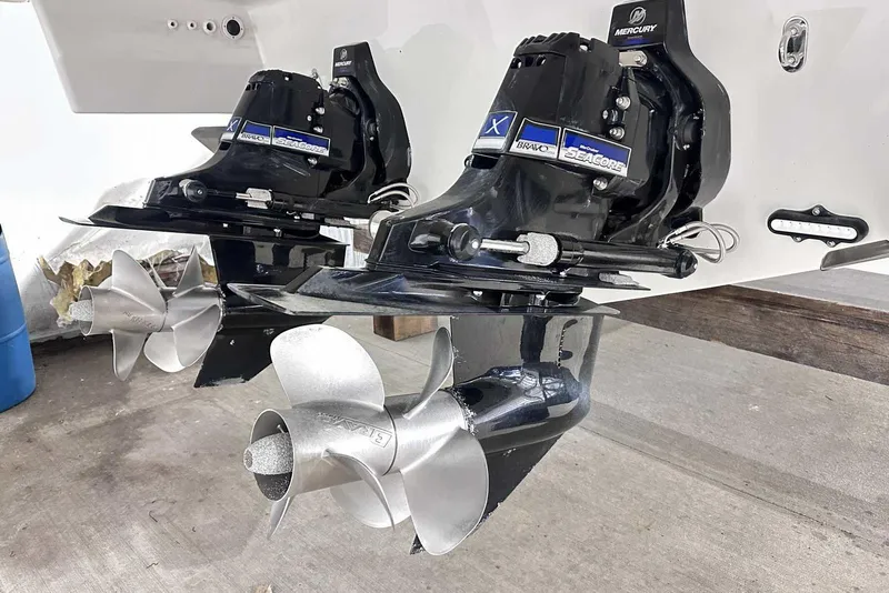 Slide: The Image of 2022 Formula 350 Sun Sport boat with dual Mercury Bravo Three outdrives and stainless steel propellers. - 4