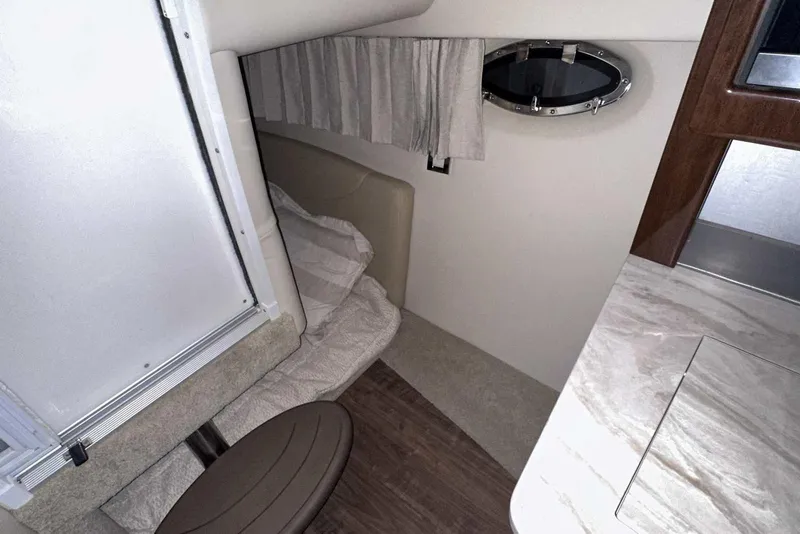 Slide: The Image of 2022 Formula 350 Sun Sport cabin interior with bed, window, and countertop. - 42