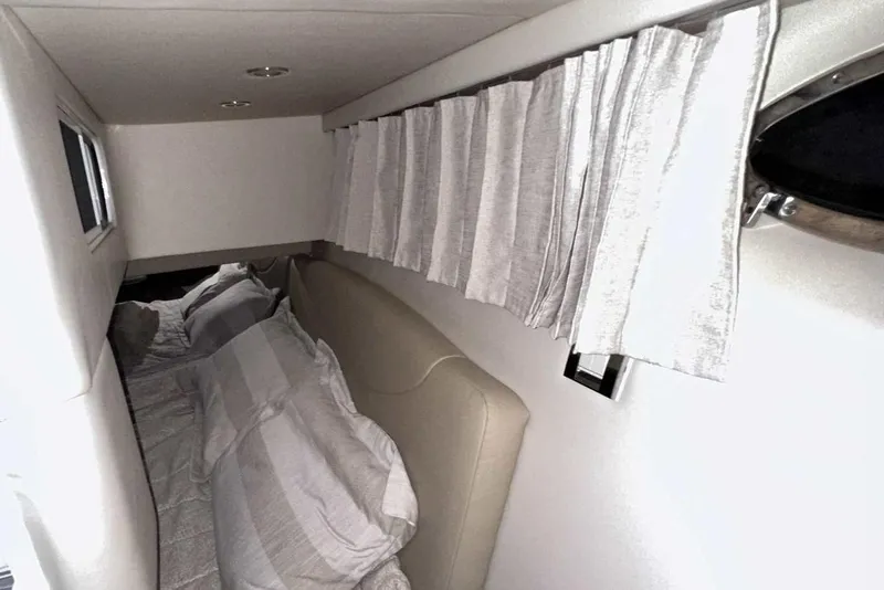 Slide: The Image of Interior cabin of 2022 Formula 350 Sun Sport with bed and curtains. - 43